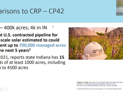Image showing a presentation slide titled "Comparisons to CRP – CP42," featuring key statistics on CP42, utility-scale solar projects in the U.S., and Indiana's solar initiatives. The slide highlights CP42's 400,000 acres, with 4,000 acres in Indiana, and mentions a potential 700,000 managed acres from contracted solar projects over the next five years. It also notes that Indiana has 15 solar projects of at least 1,000 acres, including one