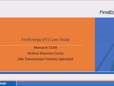 FirstEnergy case study presentation slide featuring the title "FirstEnergy (FE) Case Study," with a focus on the Monarch CCAA project, presented by Andrea Shannon-Cocco, Advanced Transmission Forestry Specialist. The slide includes the FirstEnergy logo and a backdrop of a power line structure.